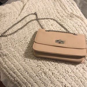 Pale pink/cream purse with silver chain strap